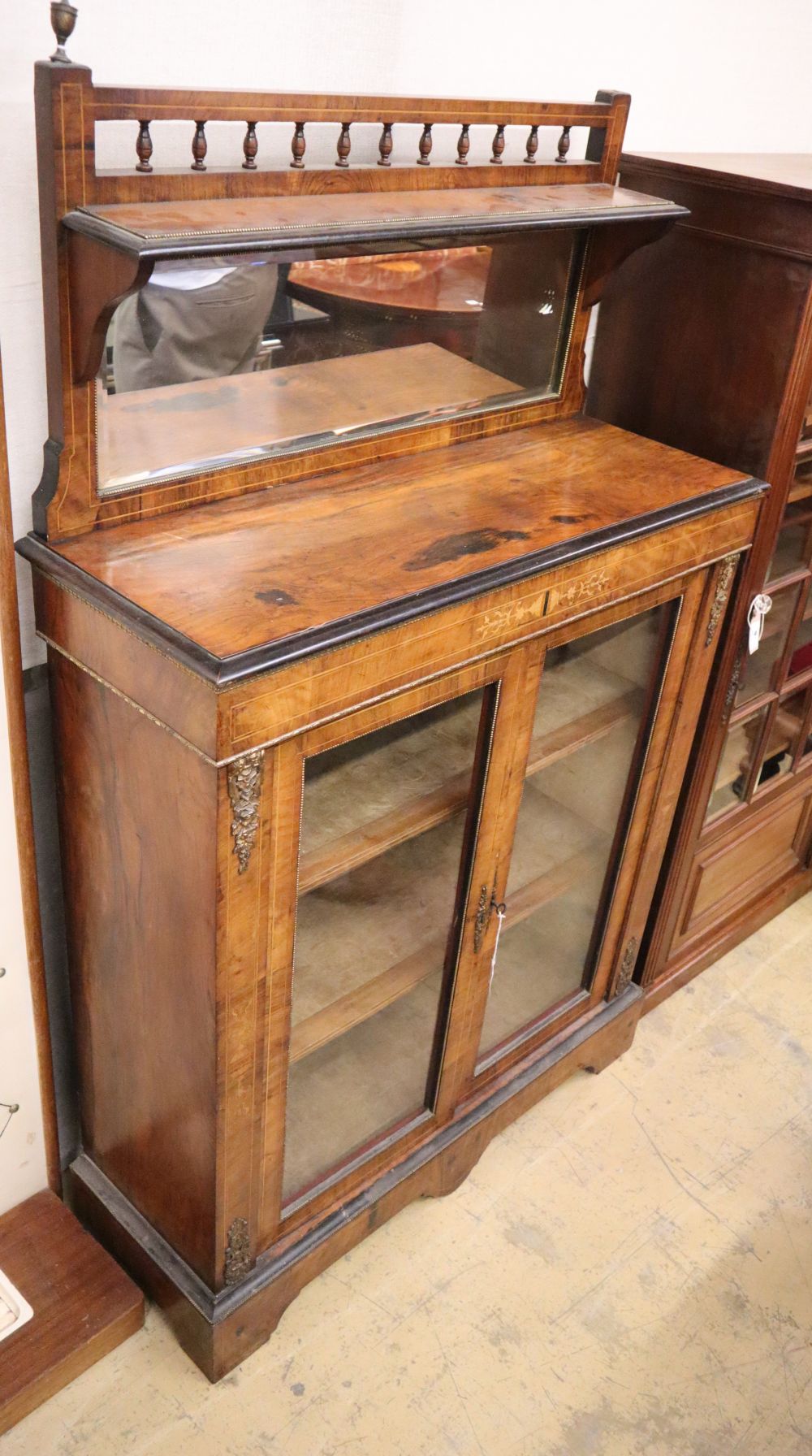 A late Victorian walnut mirror back pier cabinet, W.90cm, D.34cm, H.148cm
